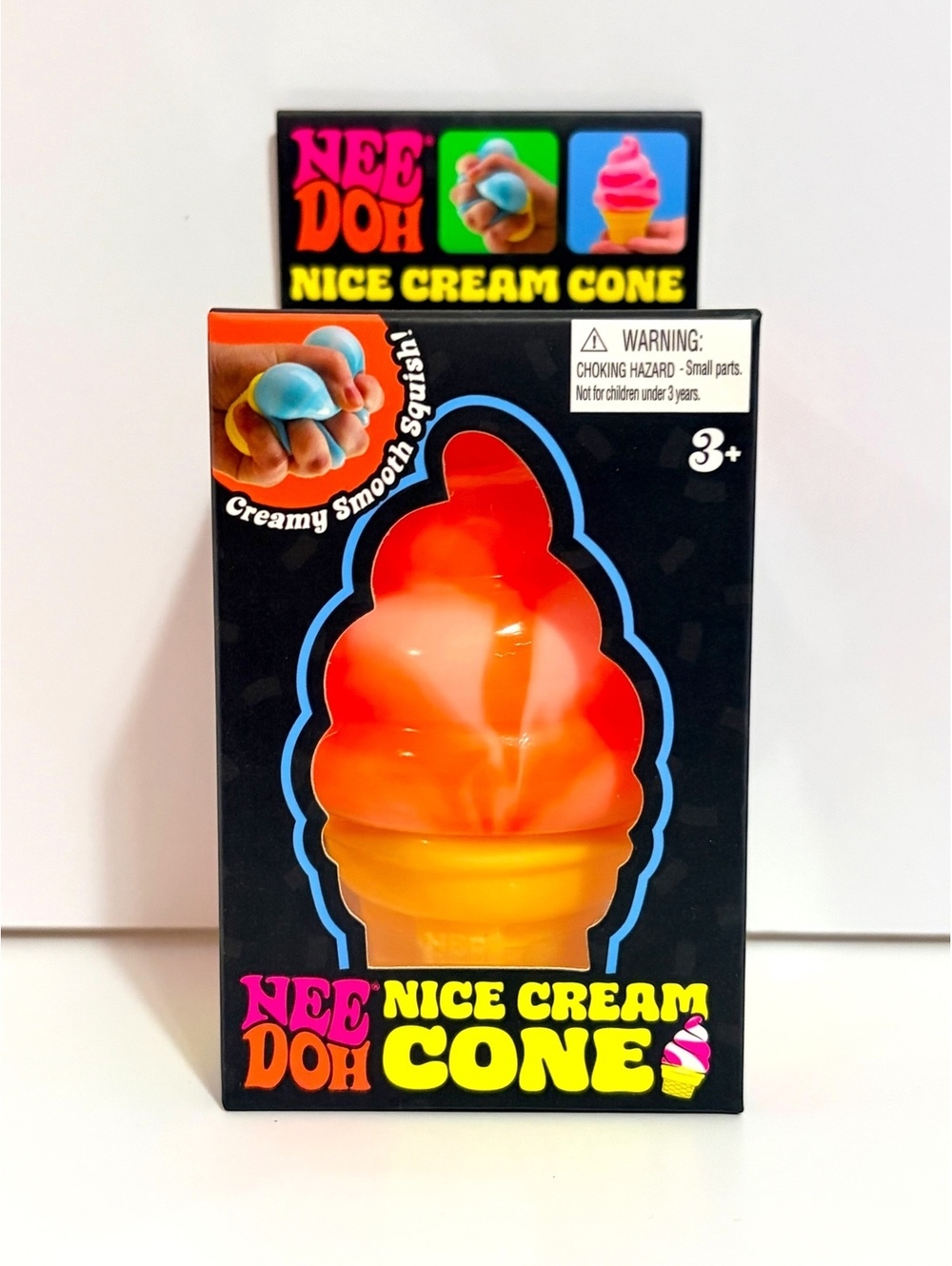 NeeDoh Nice Cream Cone Orange Swirl Squish Toy Schylling